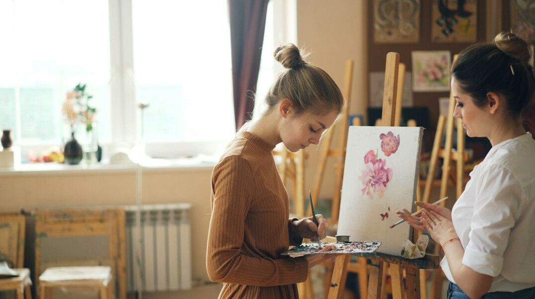 People painting together in an art workshop