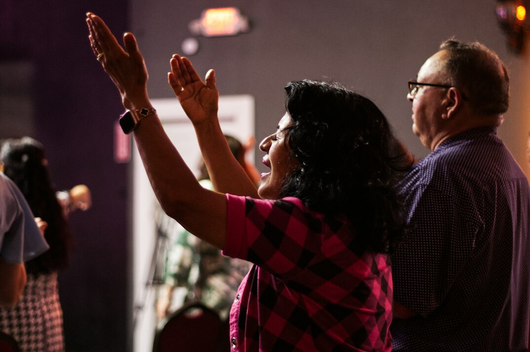 Senior couple dancing together at a community event