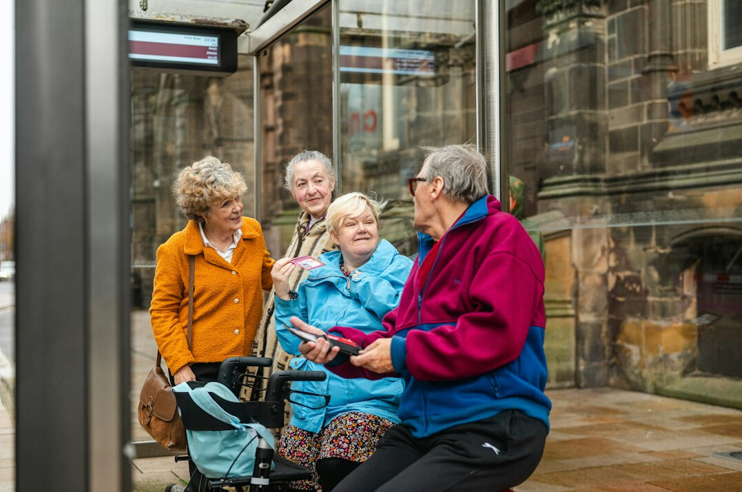 elderly people chatting in group